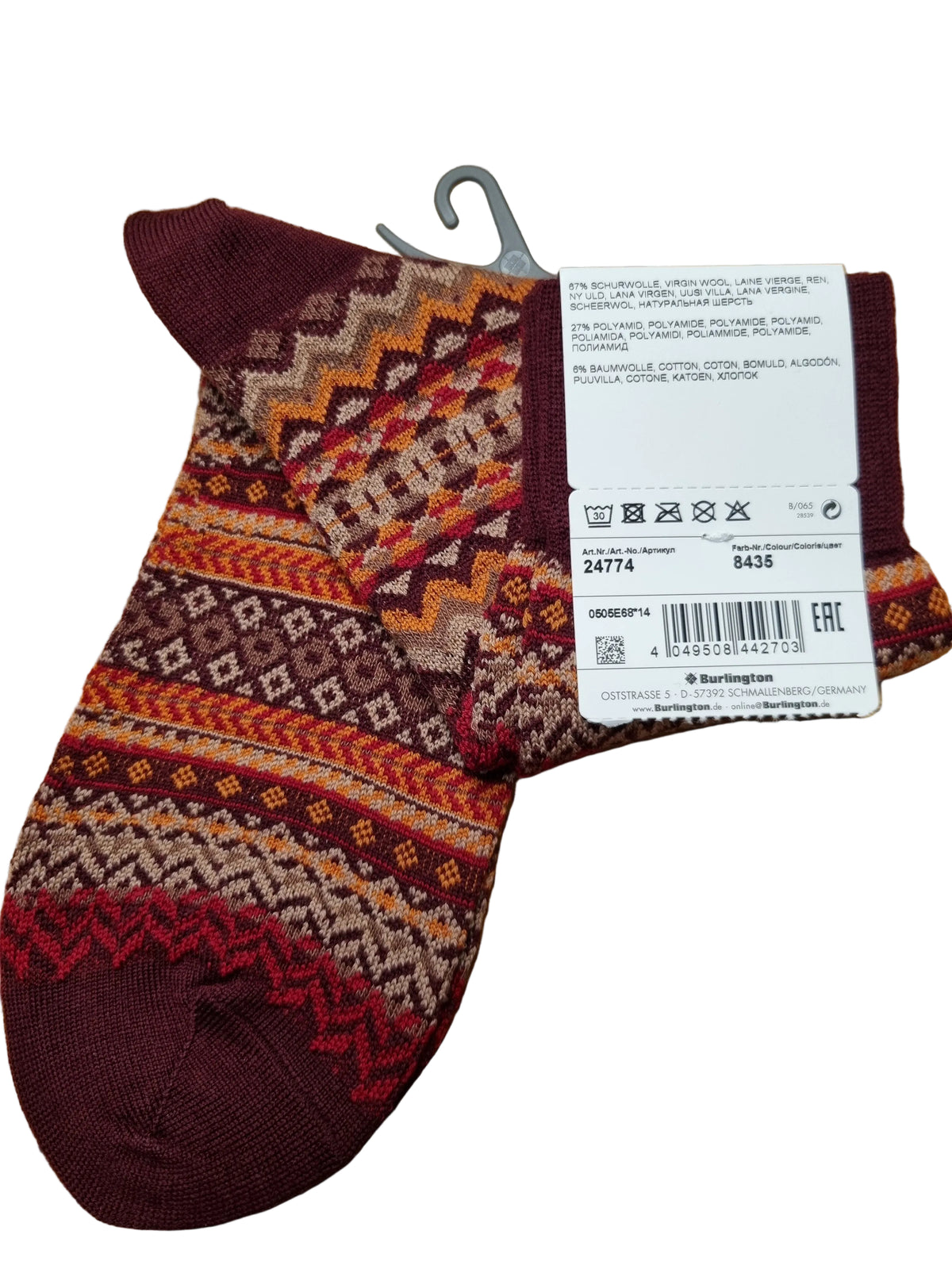 A single knit sock with a multicolor geometric Fair Isle pattern in burgundy, orange, brown, and cream,