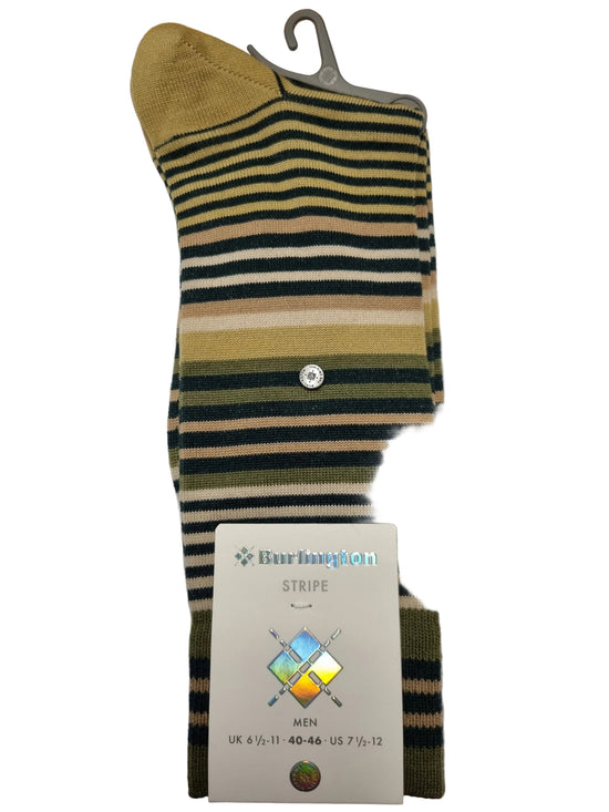 A single Barbour sock with horizontal stripes in olive green, black, tan, and cream, featuring a silver metal button and a white paper tag attached, displayed on a white sheet of paper over a wooden table.